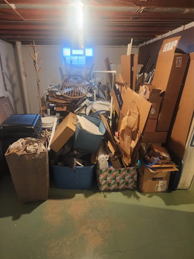 Roll-off dumpster container at job site for Yard Waste Dumpster Rental in East Haddam